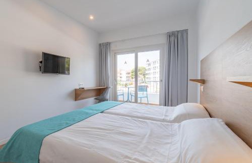 Cala Agulla Hotel | Oceanfront Hostal Alcina: Poolside Relaxation Awaits