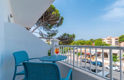 Cala Agulla Hotel | Oceanfront Hostal Alcina: Poolside Relaxation Awaits