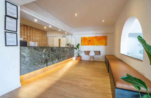 Cala Agulla Hotel | Oceanfront Hostal Alcina: Poolside Relaxation Awaits