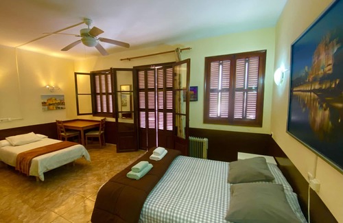 El Arenal Hostel | Discover Comfort at Hostal Atlanta with Pool and Spa