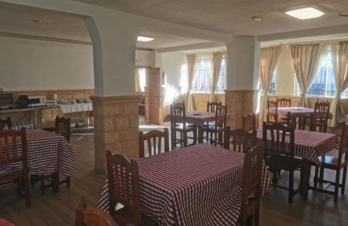 La Serna del Monte Bed & Breakfast | Pet-Friendly Retreat at Hostal Buitrago for Families