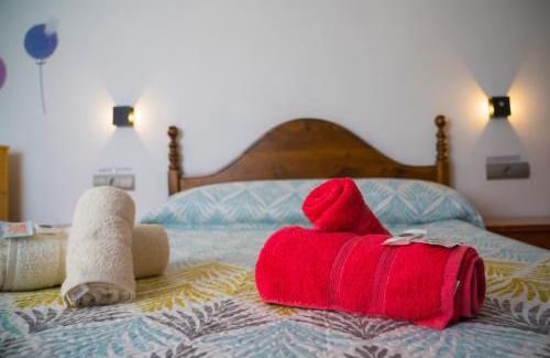Baza House | Budget-Friendly Stay at Hostal Cache - Family Friendly
