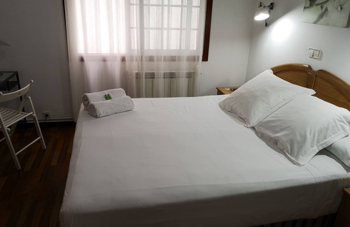 La Coruna House | Budget-Friendly Hostal Carbonara: Spa & Breakfast Included