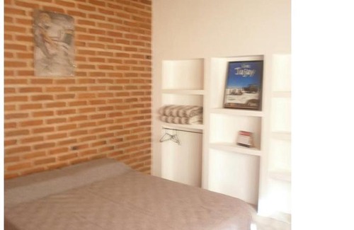 El Carmen Apartment | Pet-Friendly Retreat at Hostal Centenario: Rated 9/10