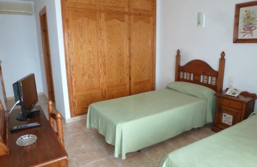 Garrucha House | Oceanfront Hostal Cortés: Family-Friendly Retreat Awaits