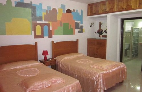 Cienfuegos House | Discover Hostal DCuba: Family-Friendly with Spa & Dining