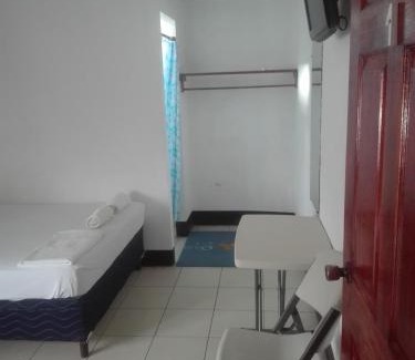 San Carlos House | Budget-Friendly Hostal Don Frank: Family-Safe & Inviting