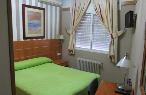 Alcala de Henares House | Discover Hostal Don Juan I: Pet-Friendly Retreat Awaits