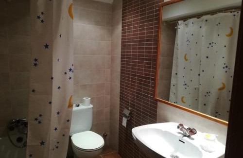 Almazan House | Cozy Hostal El Arco: Family-Friendly Stay with Dining
