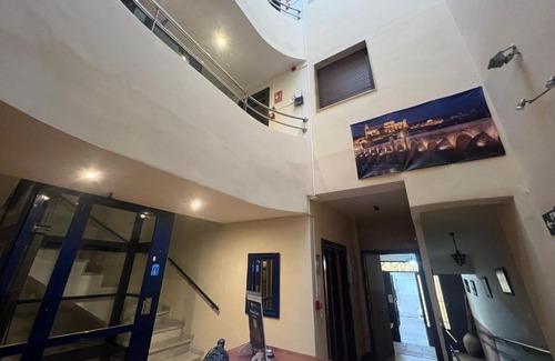 Puente Genil House | Cozy Hostal el Pasaje: Pet Friendly with Family Amenities