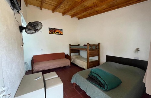 Tanti House | Discover Hostal El Trébol in Tanti - Family-Friendly Retreat