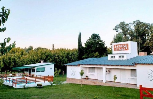 Tanti House | Discover Hostal El Trébol in Tanti - Family-Friendly Retreat