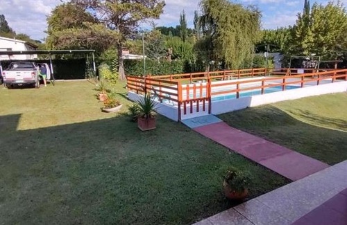 Tanti House | Discover Hostal El Trébol in Tanti - Family-Friendly Retreat