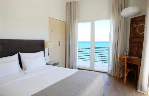 L'Escala Hotel | Relaxing Hostal Spa Empúries: Pet-Friendly Oceanfront Stay