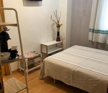 Abena House | Family-Friendly Hostal Escartín with Kitchen Amenities