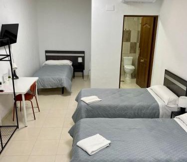 La Nucia House | Discover Hostal Kaizen: Family-Friendly with Kitchen Access