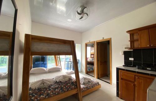 Capurgana Hotel | Discover Hostal Las Flores: Family-Friendly with Breakfast
