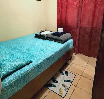 Quetzaltenango Apartment | Budget-Friendly Hostal León with Kitchen & Child Amenities