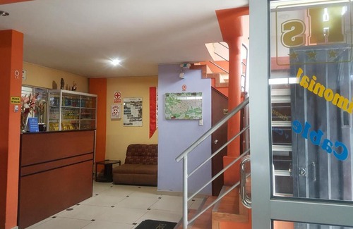 El Tambo Hotel | Budget-Friendly Stay at Hostal Los Pinos with Breakfast
