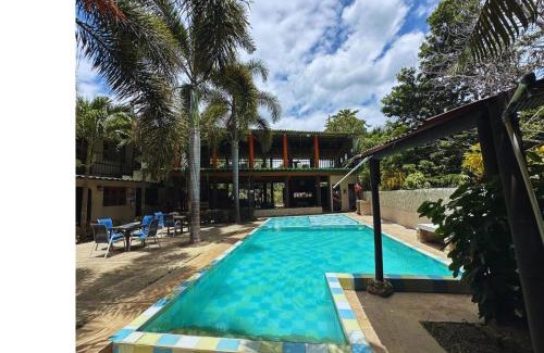 Palomino House | Relax at Hostal Luz de Luna with Ocean Views & Pool