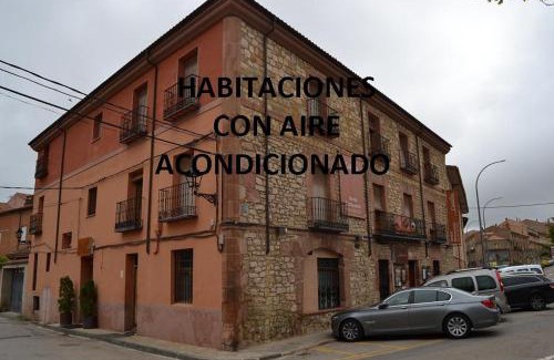 Siguenza House | Budget-Friendly Hostal Mesón Castilla: Family and Dining Delight
