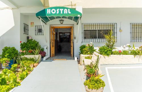 Los Canos de Meca House | Discover Hostal Miramar: Oceanfront Oasis with Pool