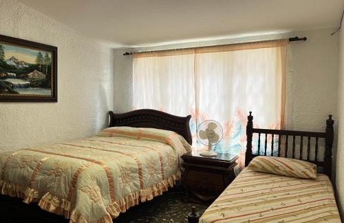 Santa Fe House | Experience Comfort at Hostal Monarca - 5 Star Retreat
