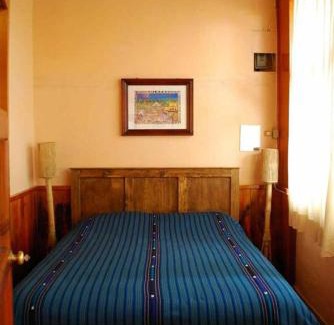 Del Cerrillo House | Budget-Friendly Hostal Casa Gaia: Pool, Pet-Friendly & More!