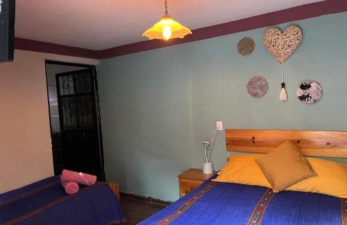Del Cerrillo House | Budget-Friendly Hostal Casa Gaia: Pool, Pet-Friendly & More!