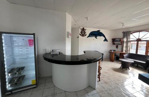 Puerto Villamil Hotel | Budget-Friendly Hostal Poseidon with Family Amenities