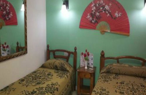Cienfuegos House | Experience Comfort at Hostal Oriente with Spa and Dining