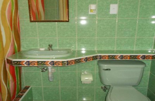 Cienfuegos House | Experience Comfort at Hostal Oriente with Spa and Dining