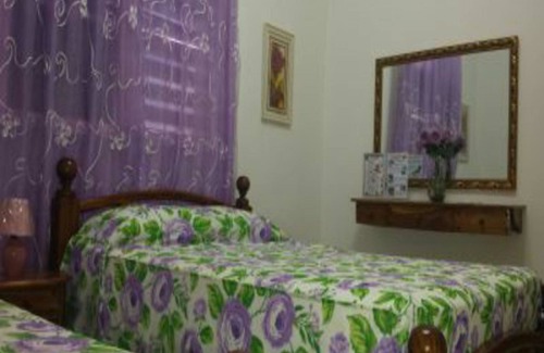 Cienfuegos House | Experience Comfort at Hostal Oriente with Spa and Dining