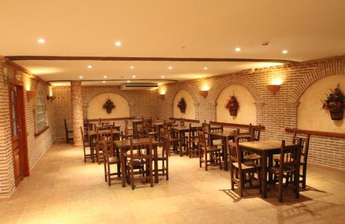 Calera Y Chozas House | Family-Friendly Stay at Hostal Restaurante Cuatro Caminos