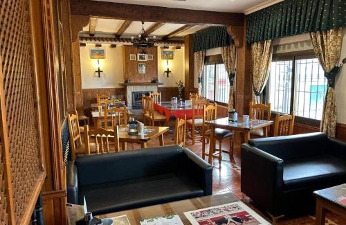 Arquillos Hotel | Pet-Friendly Hostal Restaurante La Noria with Cozy Amenities