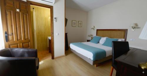 Pastrana House | Inviting Hostal Rural Moratín: Pool & Oceanfront Relaxation