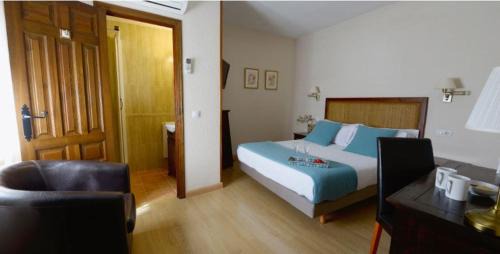 Pastrana House | Inviting Hostal Rural Moratín: Pool & Oceanfront Relaxation