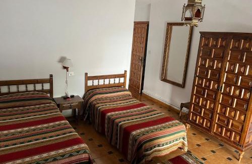 Capileira Hotel | Discover Hostal Rural Poqueira: Oceanfront Retreat Awaits