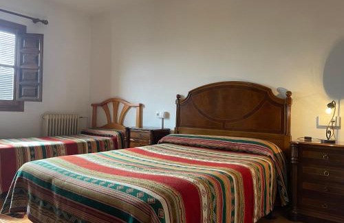 Capileira Hotel | Discover Hostal Rural Poqueira: Oceanfront Retreat Awaits