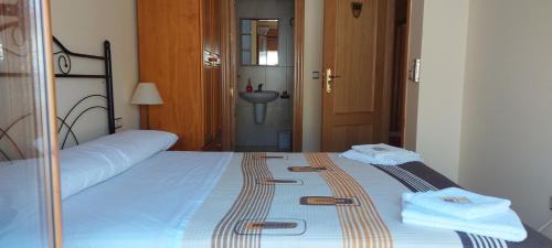 El Herrumblar House | Budget-Friendly Stay at Hostal San Julian with Breakfast