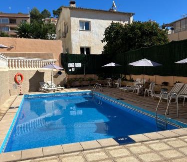 Calamayor House | Cozy Hostal San Telmo: Poolside Bliss with Ocean Views
