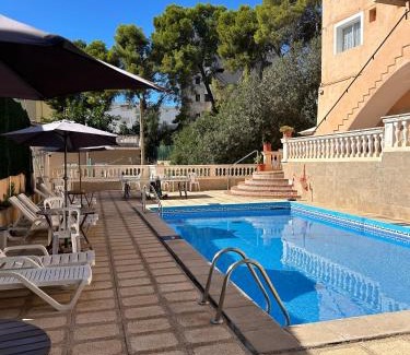 Calamayor House | Cozy Hostal San Telmo: Poolside Bliss with Ocean Views