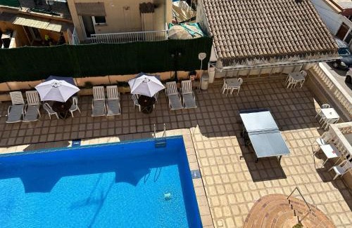 Calamayor House | Cozy Hostal San Telmo: Poolside Bliss with Ocean Views