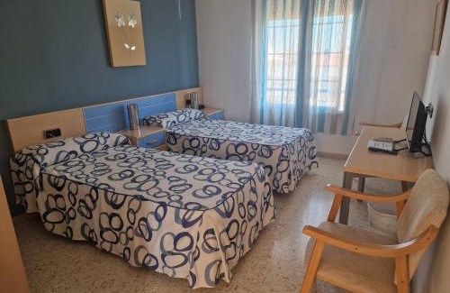 Talavera la Real House | Discover Hostal Talavera: Family-Friendly Getaway Awaits!