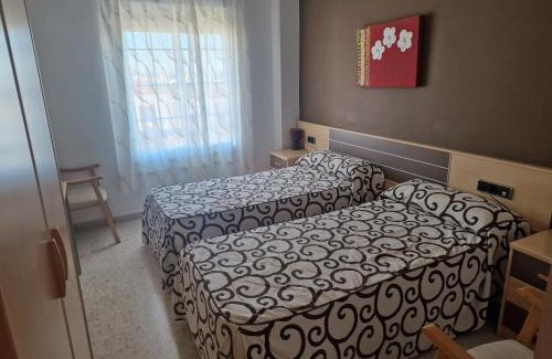 Talavera la Real House | Discover Hostal Talavera: Family-Friendly Getaway Awaits!
