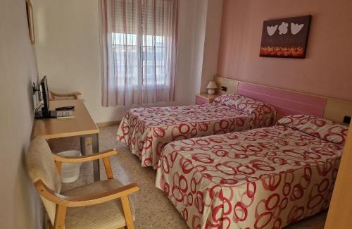 Talavera la Real House | Discover Hostal Talavera: Family-Friendly Getaway Awaits!