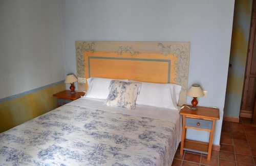 Galaroza House | Discover Hostal Toribio: Family-Friendly & Accessible Stay