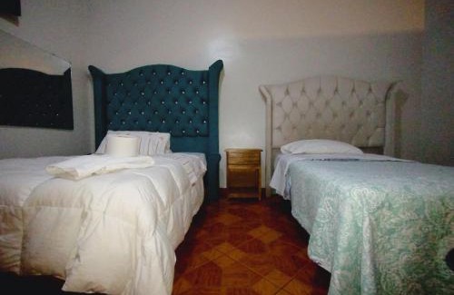 El Tambo House | Discover Family-Friendly Comfort at Hostal Toscano Suites