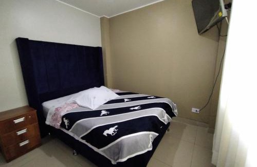 El Tambo House | Discover Family-Friendly Comfort at Hostal Toscano Suites