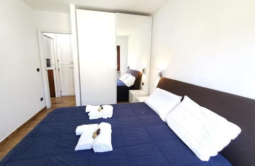 Sestriere Apartment | City Hall Suite by Hostdomus - Family-Friendly Escape